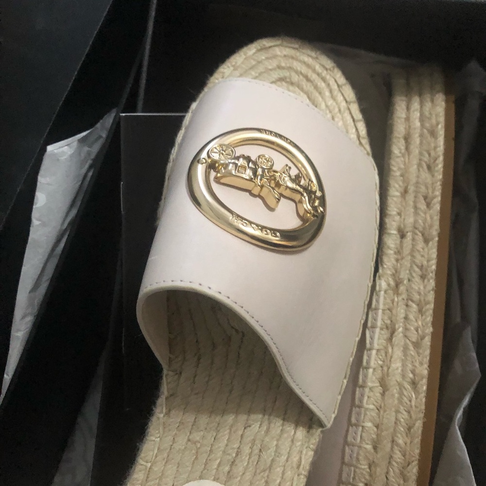 Coach sandals.